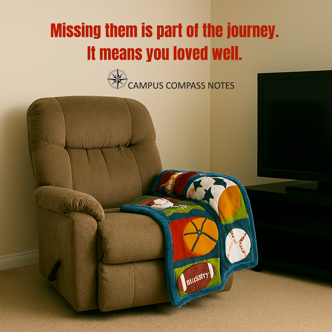 A cozy indoor scene with a brown recliner draped in a colorful sports-themed blanket. A flat-screen TV sits nearby. On the wall, red and black serif text reads: “Missing them is part of the journey. It means you loved well.” The image honors everyday spaces where love lingers—absence felt in familiar comforts, and memory held in the quiet corners of home.